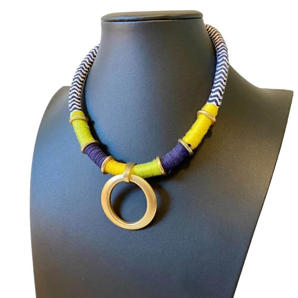 Multi Colored Thread Necklace w/ Matte Gold Toned circle Pendant.
